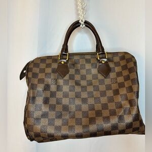 Louis Vuitton Monogram bag with Handle Straps and Vintage Lock included
